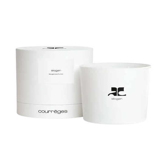 Bougie parfumée Slogan de Courrèges, fragrance aérienne à la baie de genièvre et ambretmusc