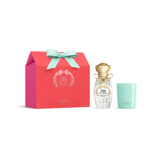 Coffret parfumé Petit Chérie d'Annick Goutal incluant eau de parfum et bougie avec ambretmusc, notes florales et fruitées.
