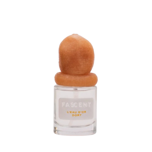 Eau de parfum L'Eau d'Or Dort de Fascent, collection Ambre et Musc, flacon évoquant douceur et fraîcheur