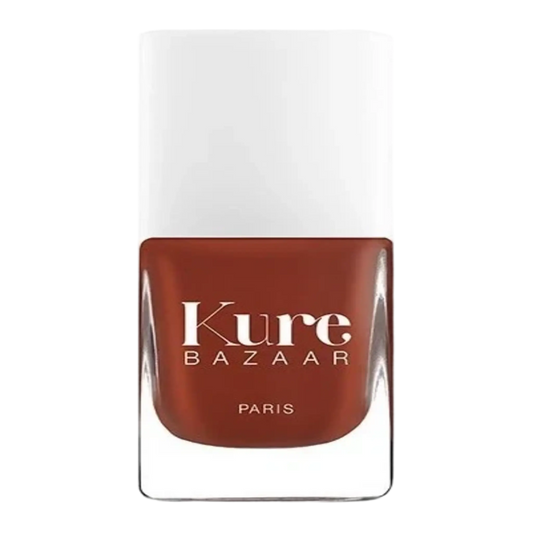 Vernis à ongles Puglia de Kure Bazaar, teinte inspirée des Pouilles mêlant rouge, orange et brun avec ambretmusc