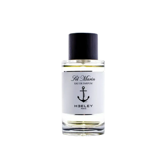 Eau de parfum Sel Marin de Heeley Ambre & Musc, notes aquatiques de citron, bergamote et vétiver sur fond boisé.