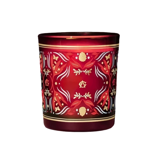 Bougie parfumée Une Forêt d'Or de Annick Goutal dans la collection ambretmusc, senteurs boisées et agrumes pour les fêtes