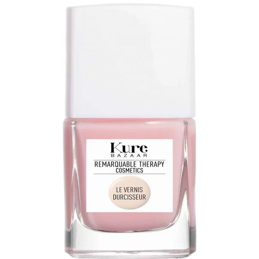 Vernis durcisseur teinté rose nude Kure Bazaar ambretmusc pour renforcer ongles fragiles