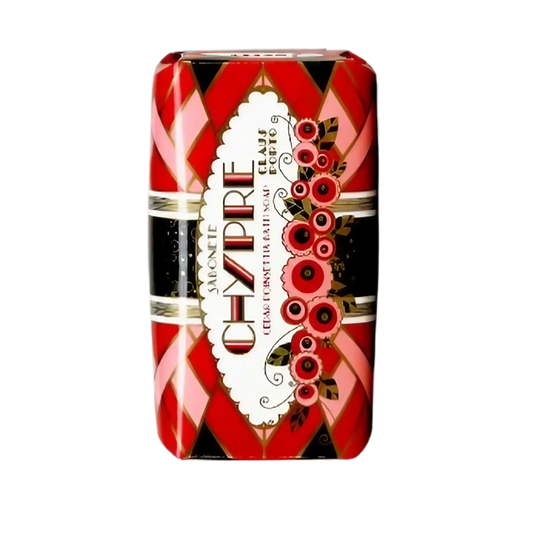 Savon solide Chypre Cedar Poinsettia de Claus Porto, avec parfum ambretmusc et huile de karité nourrissante pour une peau apaisée.