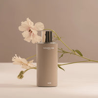 Flacon de l'extrait de parfum Nude 100 ml de La Bouche Rouge avec ambretmusc