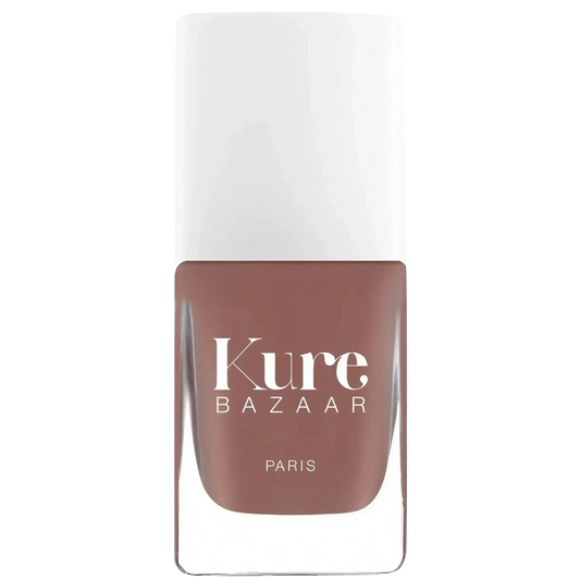 Vernis à ongles Zoe de Kure Bazaar, teinte beige rosée de la collection ambretmusc, couvrance totale pour un look naturel