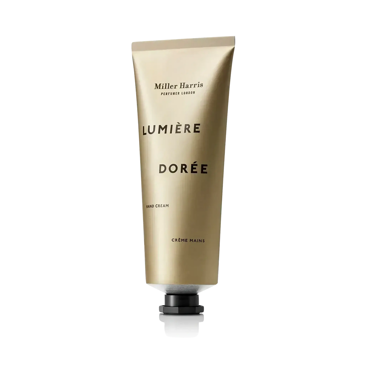 Image qui affiche Crème pour les mains Crème pour les Mains Lumière Dorée d'une contenance de 75ml Neuf. Une création par la Marque Miller Harris et vendu par Ambre&Musc Parfumerie de Niche et Institut de Beauté.